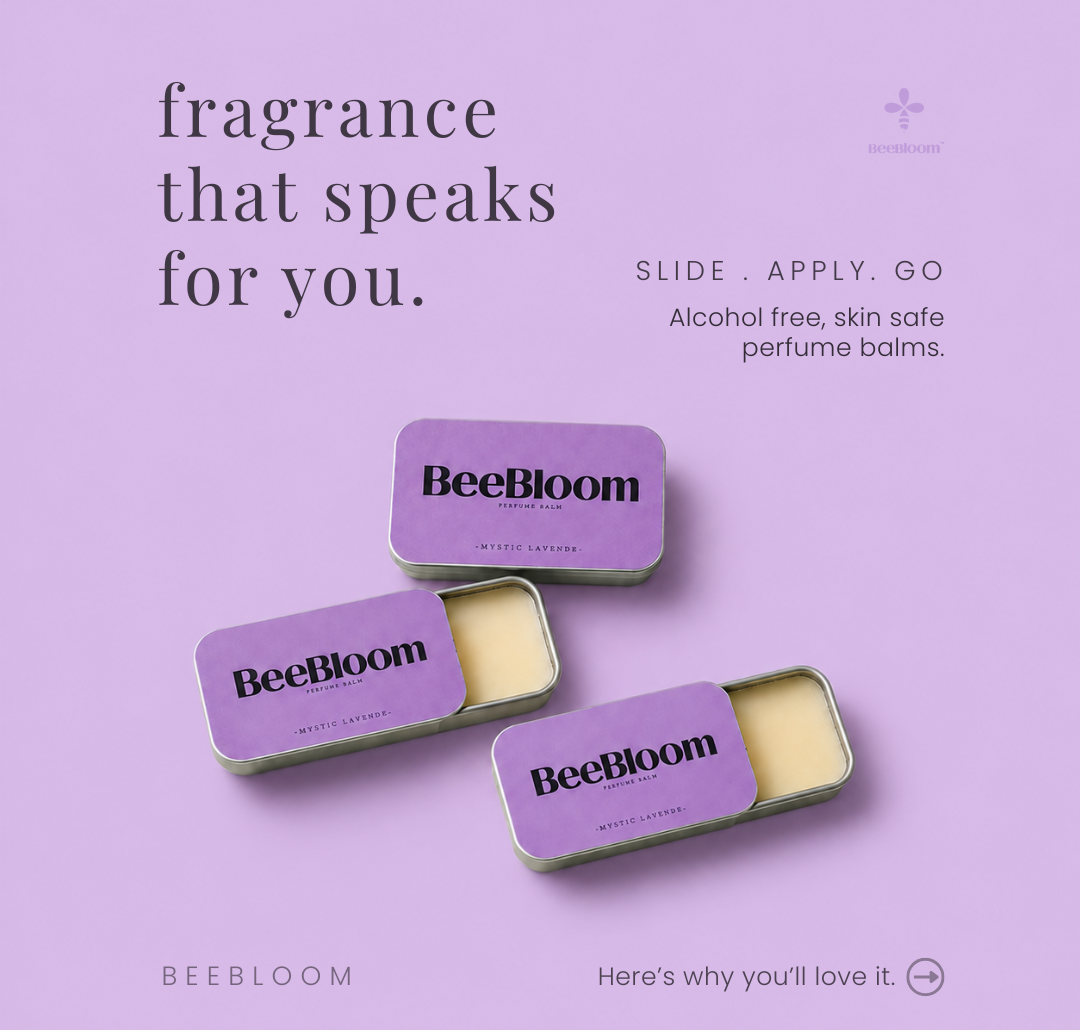Purple promotional graphic for BeeBloom perfume balms showing three small rectangular metal tin containers on a lavender background with marketing text.